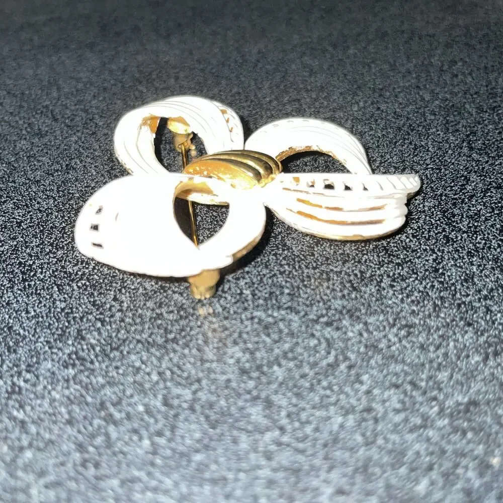 Vintage MONET Gold Tone, White Enamel Fancy Bow Design Brooch Stamped